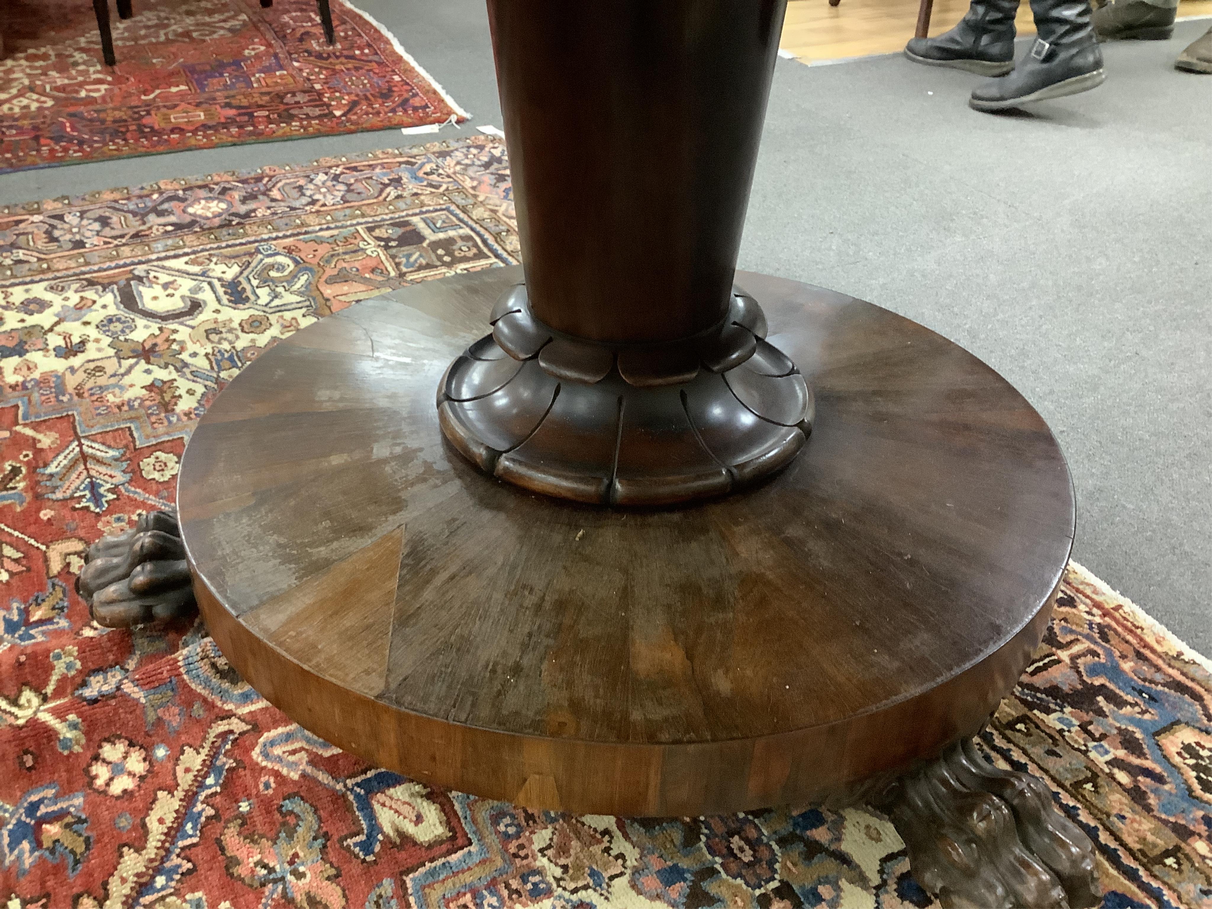 An early Victorian circular rosewood tilt top breakfast table, diameter 128cm, height 72cm
